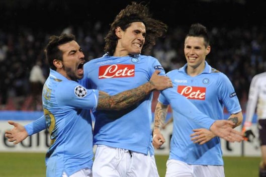 Napoli's Edinson Cavani, center, of Uruguay, celebrates with his teammates Argentina's Ezequiel Lavezzi, left, and Slovakia's Marek Hamsik after scoring, during a Champions League, round of 16, first-leg soccer match, at the Naples San Paolo stadium, Italy, Tuesday, Feb. 21, 2012. Ezequiel Lavezzi and Edinson Cavani again dampened English hopes by leading Napoli to a 3-1 win over Chelsea in an entertaining first leg of their Champions League last-16 matchup. (AP Photo/Salvatore Laporta)